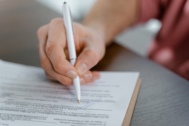 person signing lease document