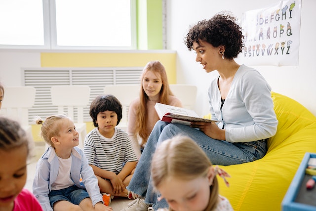 teacher reading to classroom