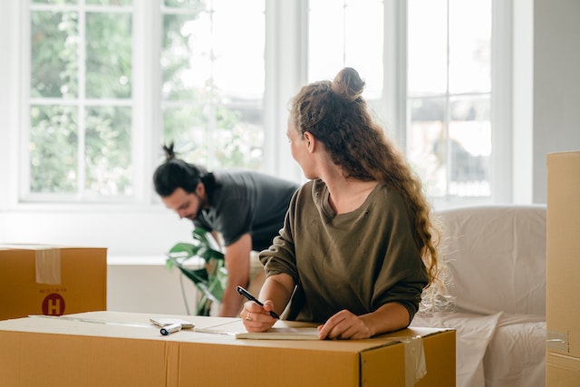 man and woman moving in