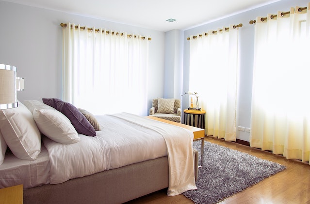 bedroom with bed and curtains